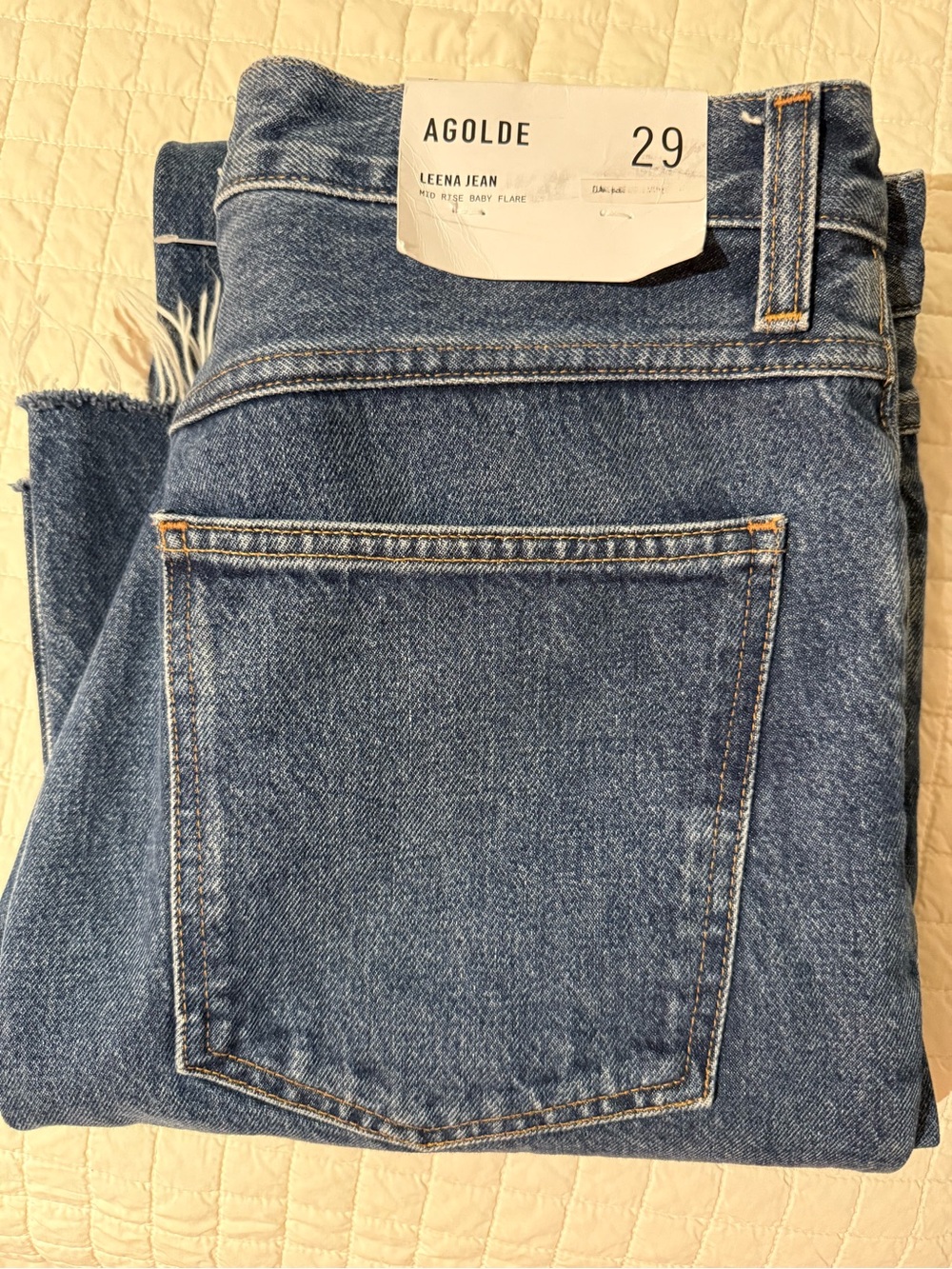 Agolde Leena high-rise baby flare jeans in Placebo